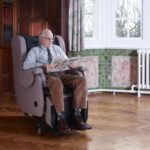 person sitting in tilt in space chair, careflex hydrotilt