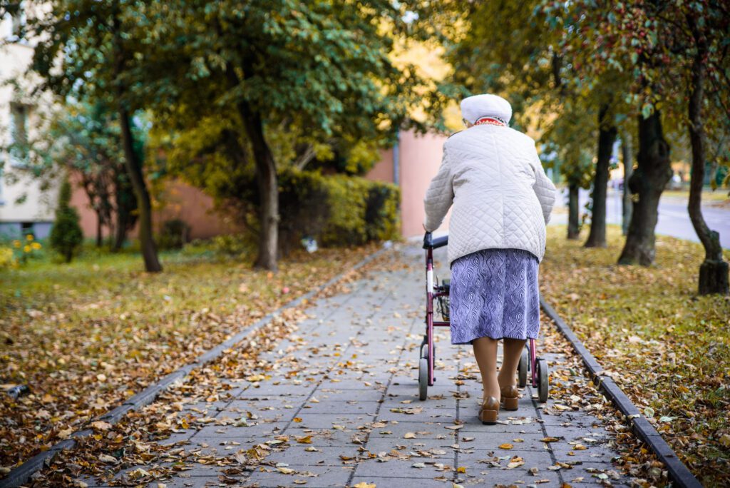 Ideal Walker Elderly woman with the walker being used outdoors